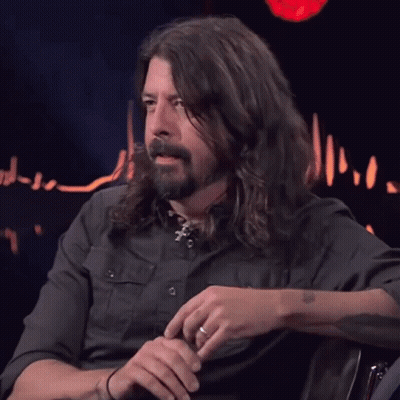 Man With Arm Tattoo Covering Face GIF