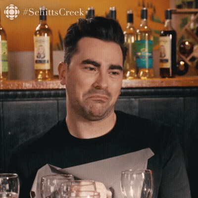 Man With Arm Tattoo Covering Face GIF