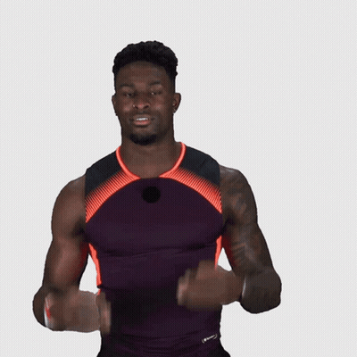 Man With Arm Tattoo In Purple Shirt GIF