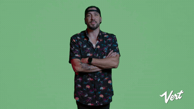 Man With Arms Crossed In Front Of Green Background Saying Packaging That's As Unique As You Are GIF