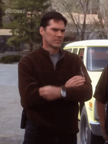 Man With Arms Crossed In Front Of Yellow Van Hashtag Hotchgifs GIF