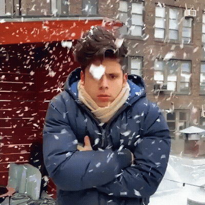 Man With Arms Crossed In Snow GIF