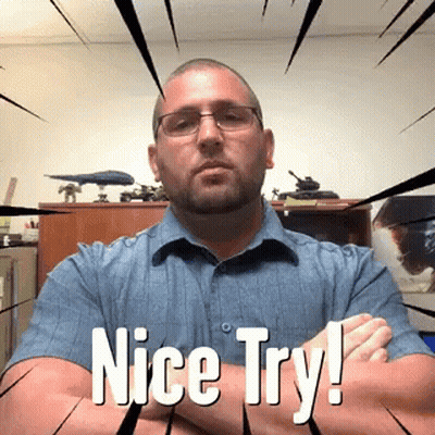 Man With Arms Crossed Saying Nice Try GIF