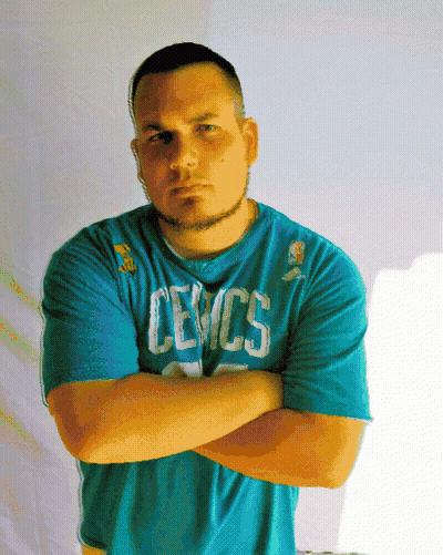 Man With Arms Crossed Wearing Cevcs Shirt GIF