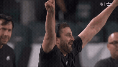 Man With Arms In Air NFL Logo GIF