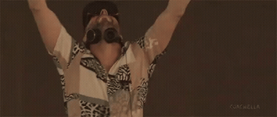 Man With Arms In Air Wearing Sunglasses And Headphones GIF