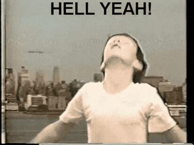 Man With Arms Outstretched And Hell Yeah Sign GIF