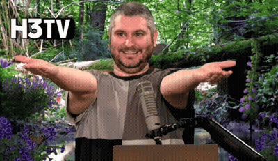 Man With Arms Outstretched In Front Of Microphone With H3TV GIF