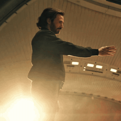 Man With Arms Outstretched In Room GIF