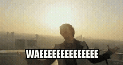 Man With Arms Outstretched On Building Saying Wae GIF