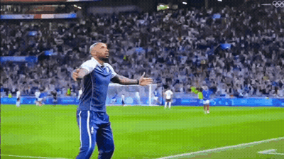 Man With Arms Outstretched On Soccer Field GIF