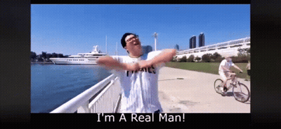 Man With Arms Outstretched Saying I'm A Real Man GIF
