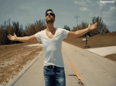 Man With Arms Outstretched Saying Trendizsst GIF