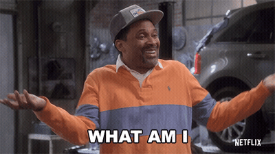 Man With Arms Outstretched Saying What Am I In Front Of Car GIF