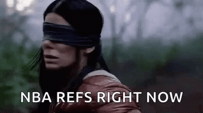 Man With Arms Outstretched Wearing Fila Shirt GIF