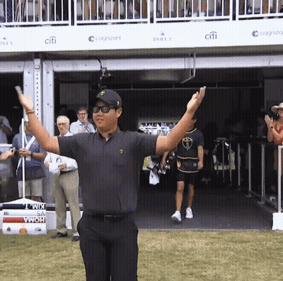 Man With Arms Raised At Citi Sign GIF