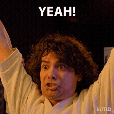 Man With Arms Up And Netflix Logo GIF
