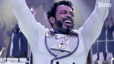 Man With Arms Up In White Purple Outfit Saying The Boys GIF