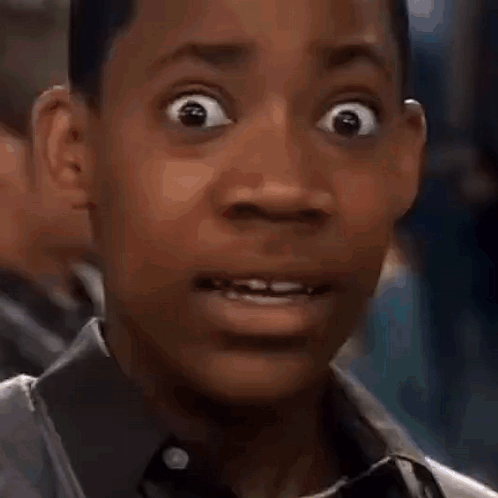 Man With Backpack In Hallway GIF