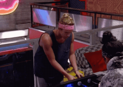 Man With Backpack Playing Video Game On Computer GIF