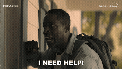 Man With Backpack Saying I Need Help In Front Of Paradise Sign GIF