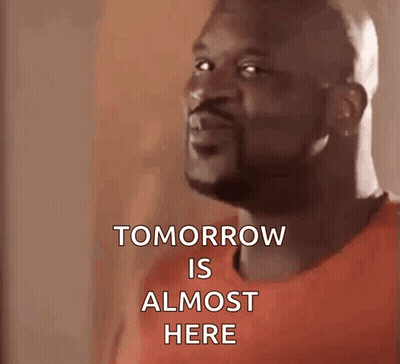 Man With Backpack Standing In Front Of Sawmill Sign GIF