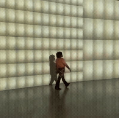 Man With Bandage Lying Near Black Luck Sign GIF