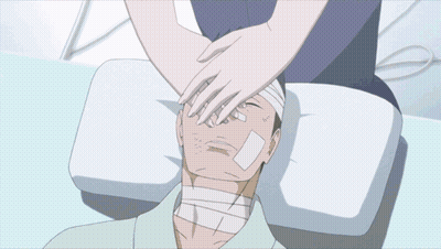 Man With Bandage On Face Laying Down GIF