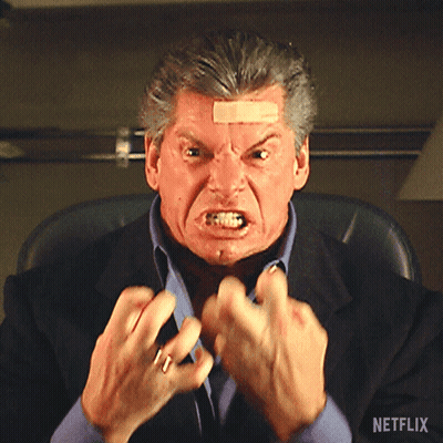 Man With Bandage On Forehead Sitting In Chair With Netflix Logo GIF