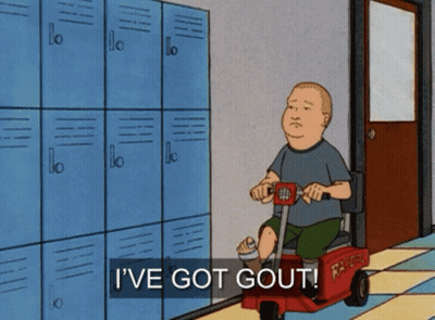 Man With Bandage On Forehead Sitting On Couch GIF