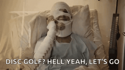 Man With Bandage On Head Laying In Hospital Bed GIF