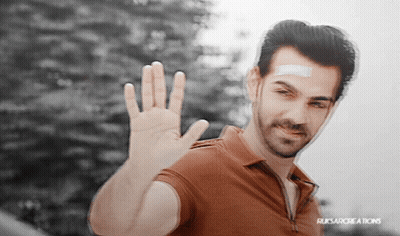 Man With Bandage Waving At Ruksarcreations Sign GIF