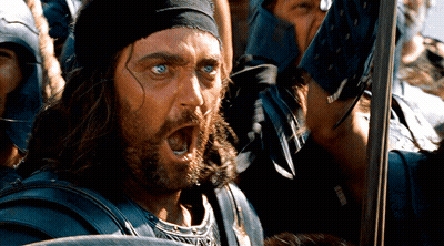 Man With Bandana Holding Sword Screaming GIF