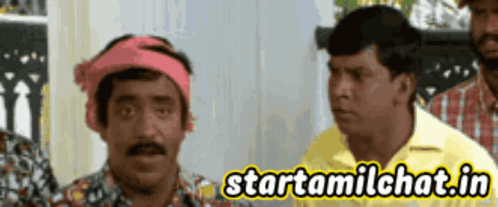 Man With Bandana Next To Man GIF
