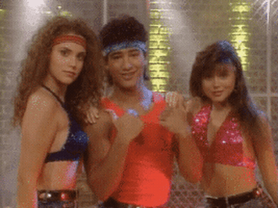 Man With Bandana Posing With Two Women GIF