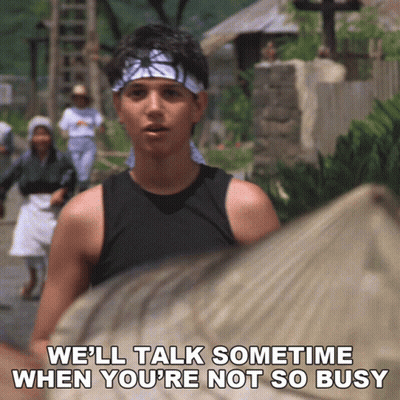 Man With Bandana Says We'll Talk Sometimes When You're Not So Busy GIF