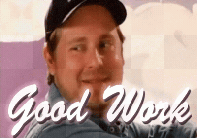 Man With Baseball Cap Smiling At Good Work Sign GIF