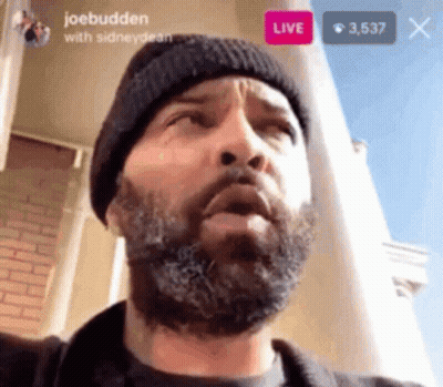 Man With Beard And Black Beanie Looking Up GIF