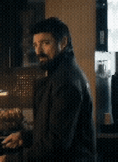 Man With Beard And Black Jacket In Kitchen GIF