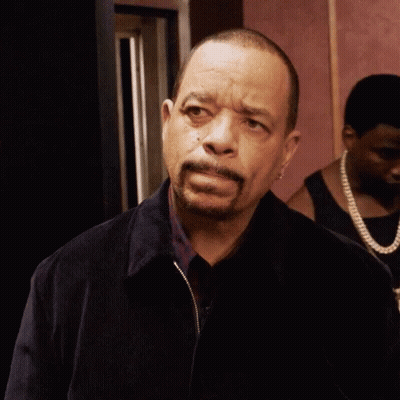 Man With Beard And Black Jacket Looking At Camera GIF