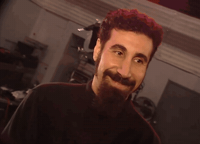 Man With Beard And Black Shirt Smiling GIF
