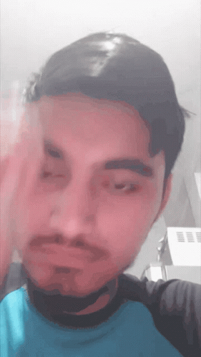 Man With Beard And Blue Shirt Making Face GIF