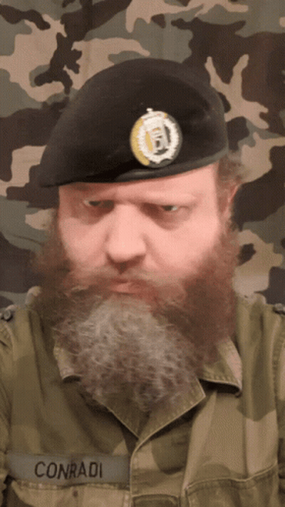 Man With Beard And Conradi On Jacket GIF
