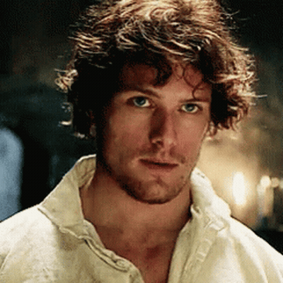 Man With Beard And Curly Hair In White Shirt GIF