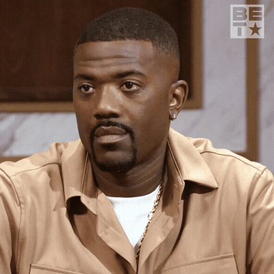 Man With Beard And Earrings In Tan BET Shirt GIF