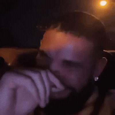 Man With Beard And Earrings Smiling GIF