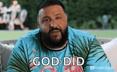 Man With Beard And Flamingo Shirt Sitting On Couch GIF