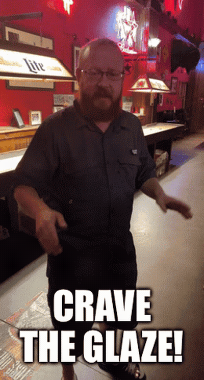 Man With Beard And Glasses Dancing In Bar Saying Crave The Glaze GIF