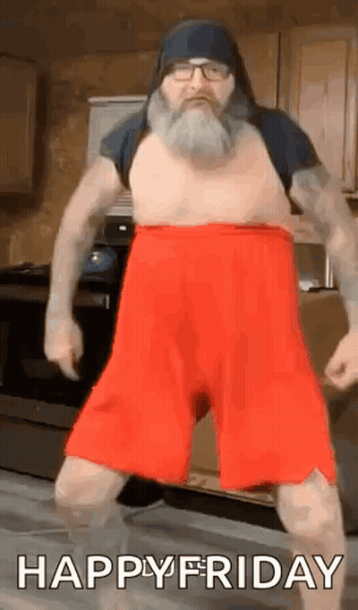 Man With Beard And Glasses Dancing In Kitchen GIF