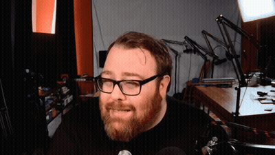 Man With Beard And Glasses In Black Shirt GIF